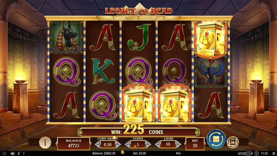 Three Scatter symbols appearing in Legacy of Dead slot, triggering the Free Spins bonus round.