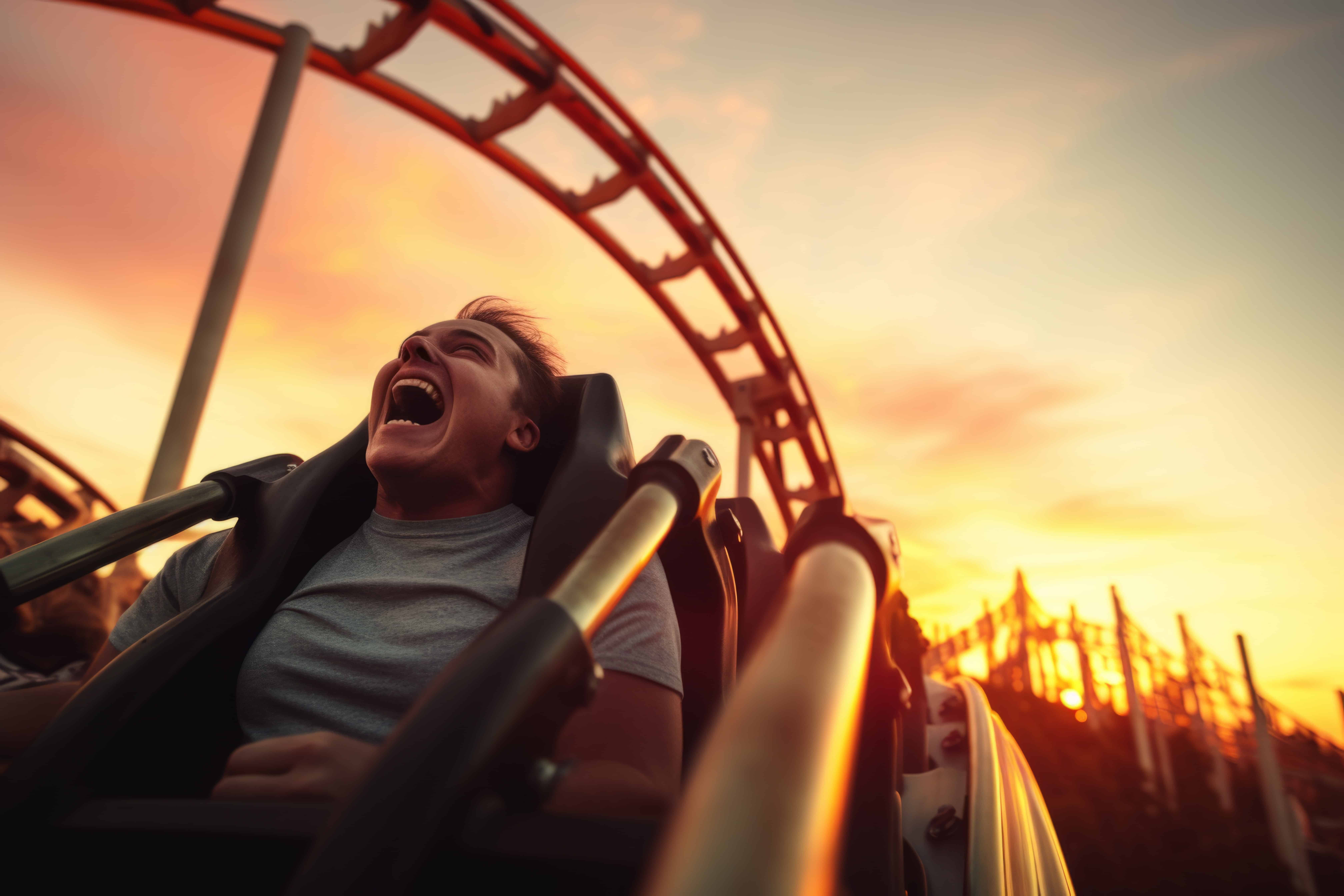 Stunned enthusiastic happy funny shocked amazed wonder screaming yelling male guy open mouth wide scream shout yell joyful young man riding rollercoaster amusement park amazing attraction fun holiday.