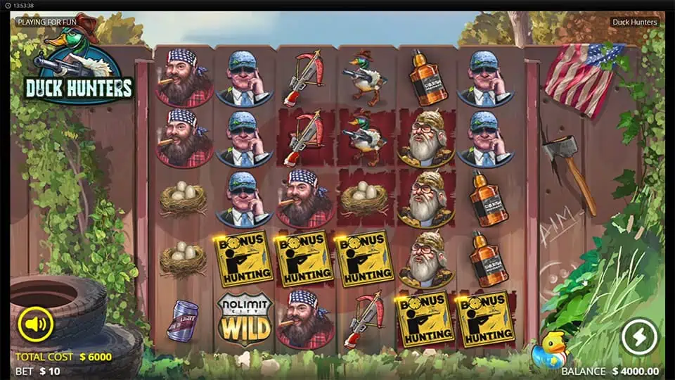 Five Scatter symbols appearing in Duck Hunters slot, triggering the Big Game Spins bonus round.