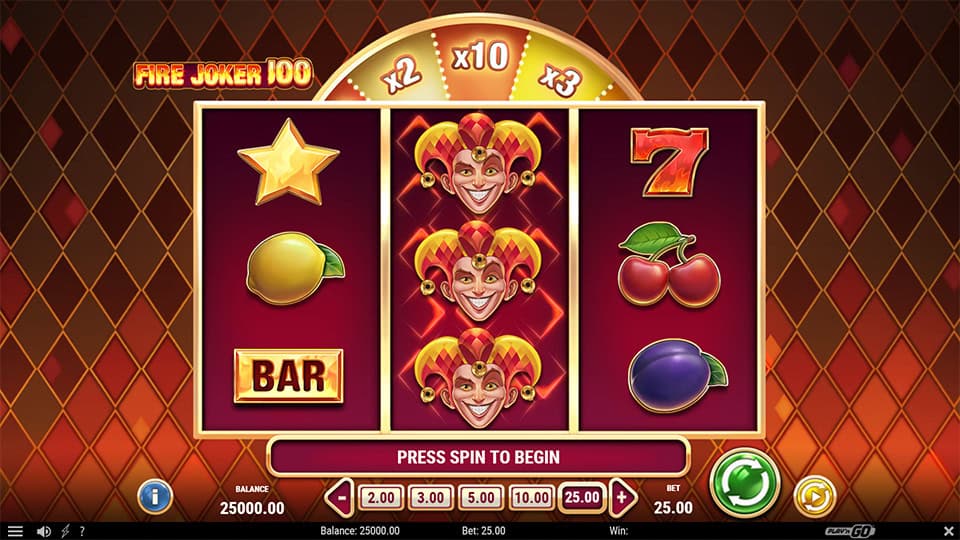 Main screen of Fire Joker 100 slot showing three reels with classic symbols like stars, lemons, BAR, and the joker on a fiery backdrop.