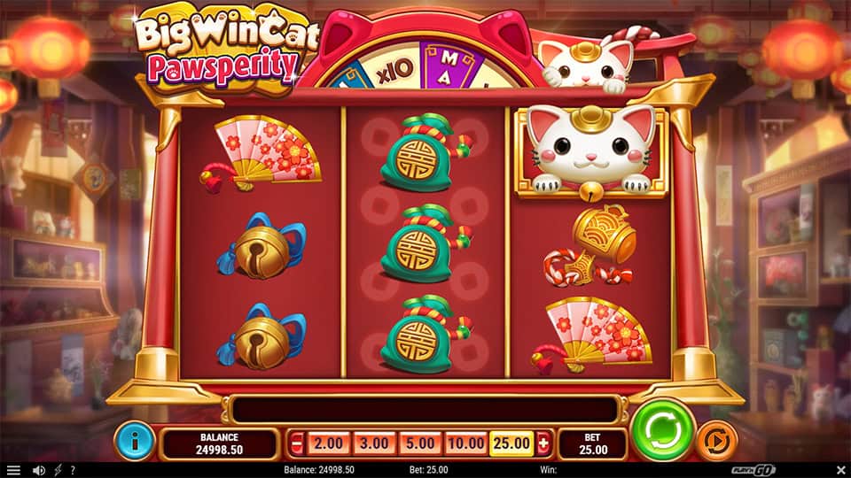 Big Win Cat Pawsperity slot grid with bells, fans, lucky charms, and waving cat symbols.