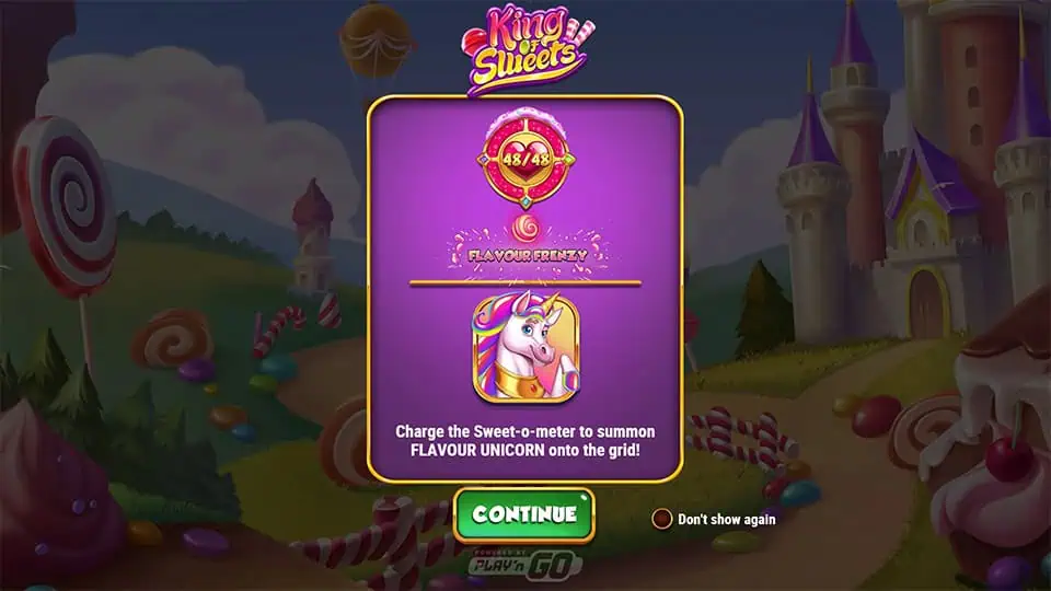 Intro screen of King of Sweets with a castle, candy-filled meadows, and a 48/48 Sweet-o-meter ready to trigger Flavour Frenzy.