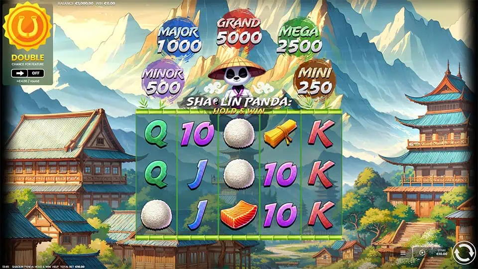Base game screen of Shaolin Panda slot showing colorful reels with dumplings, rice balls, and card symbols against a temple backdrop.