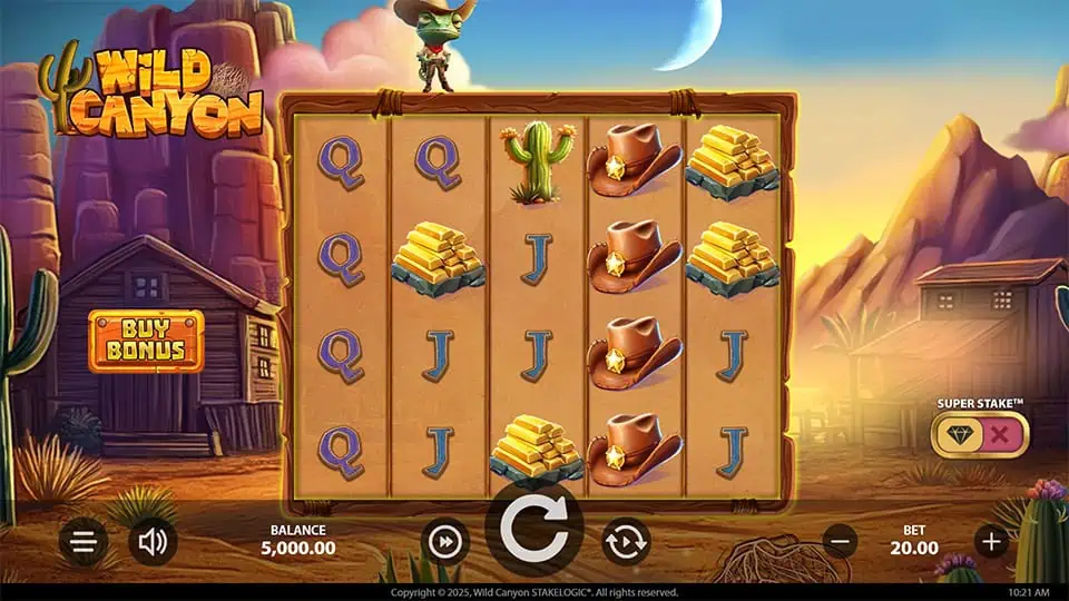 Wild Canyon base game screen with desert-themed symbols like gold bars, cowboy hats, and cacti on parchment reels.