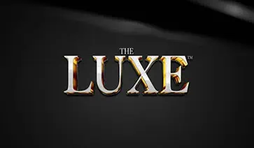 The Luxe slot logo with sleek silver and gold design over a black background.