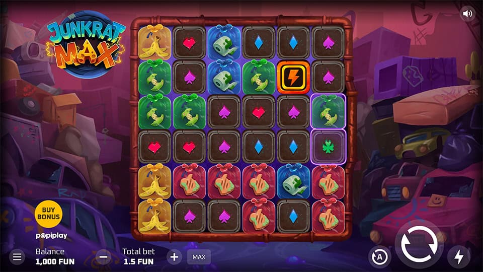 Slot layout with grid-style reels featuring colorful symbols like bananas, dice, and power tiles in a scrapyard scene.
