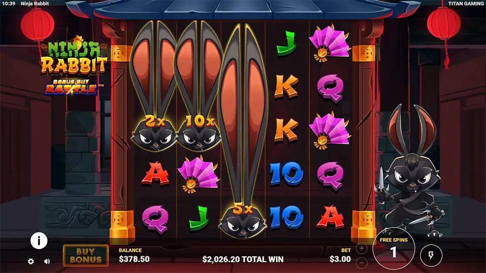 Three wild rabbit symbols with multipliers expanding vertically during a free spin.