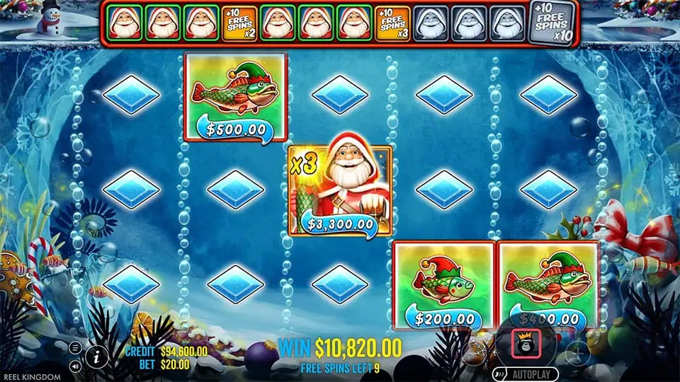 Free spins round showing Santa with a x3 multiplier collecting money fish symbols underwater.