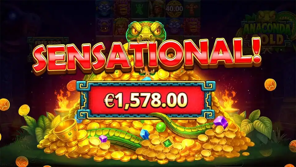 Sensational win in Anaconda Gold shown on a gold coin pile with gems.