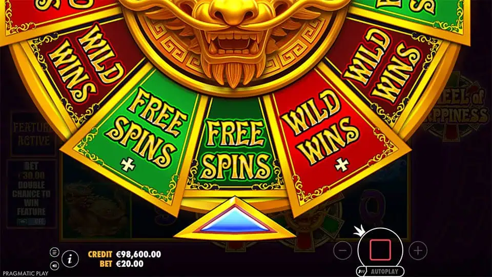 Bonus wheel feature in Wheel of Happiness slot with segments labeled Free Spins and Wild Wins under a golden lion centerpiece.