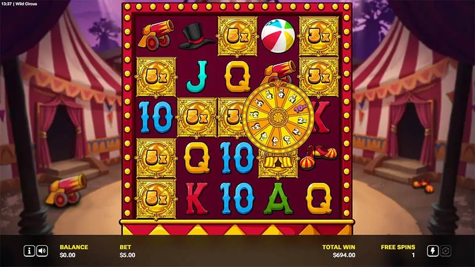 Free spins round in Wild Circus featuring a large golden prize wheel and reel symbols with visible multipliers.